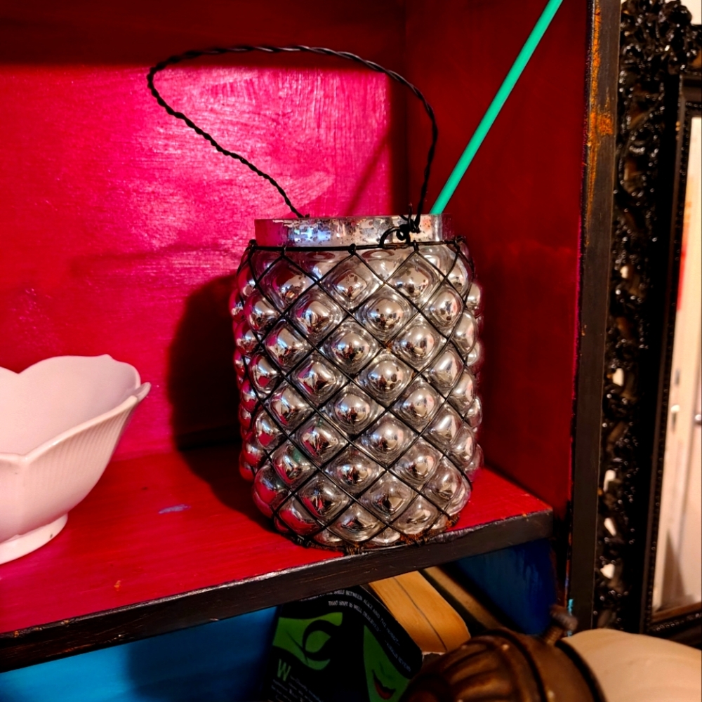 Hanging glass candle holder